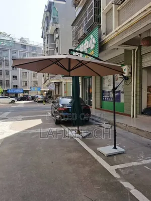 Photo - Garden Umbrella and Garden Chair