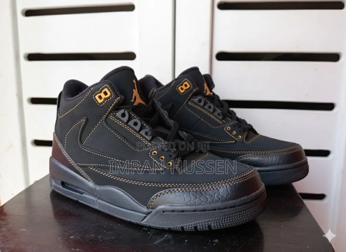 Premium Black Mid-Top Sneakers – Gold Stitch Edition