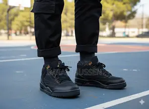 Premium Black Mid-Top Sneakers – Gold Stitch Edition