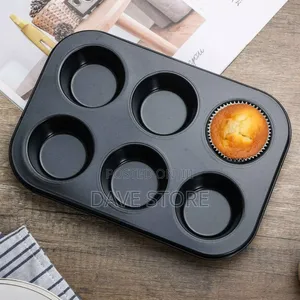 A Muffin Tin, Typically Used for Baking Muffins or Cupcakes.