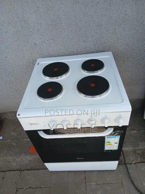 Photo - Media Standing Stove With Oven