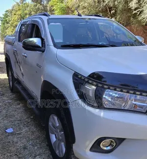 Photo - Toyota Hilux Revo Double Cab Deisel 2.4 RWD 2019 White