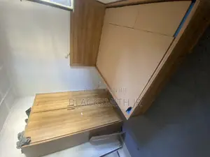 Photo - Bed and Wardrobe ኣልጋ እና ቁምሳጥን