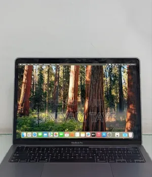 Photo - New Apple MacBook Pro Max 2023 M2 14-Inch 8GB Intel Core I5 SSD 256GB