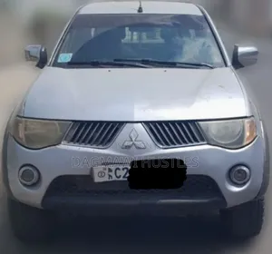 Photo - Mitsubishi L200 2006 Silver
