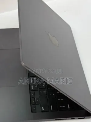 Photo - New Apple MacBook Pro 2024 M4 14-Inch 16GB Apple M4 Pro SSD 512GB