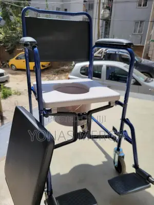 Photo - Commode Wheelchair With Flip Armrest, Cushion, Commode Bin, Leg Rests