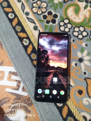 Photo - Infinix Smart 6 32 GB Bronze