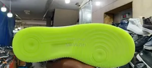 This Is Apair of White Nike Air Force 1 Low_top Snickers