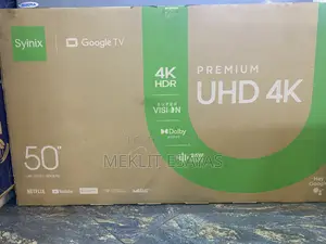 Photo - Syinix Flat Screen Television