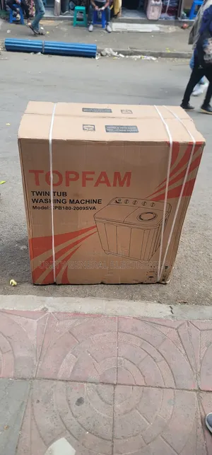 Photo - Top Fam Washing Machine