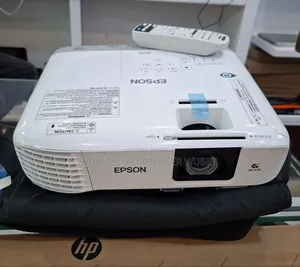 Tbrand New Epson Projector 
Has Remote and Bag 
Model Name