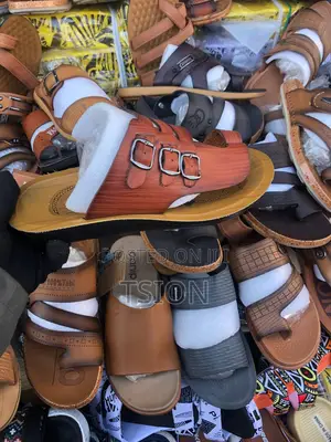 Photo - የተለያዩ ጫማ ዋች