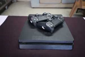 Photo - Ps4 Slim ፕለይስቴሽን 4 እስሊም