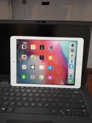 Photo - New Apple iPad 9.7 64 GB Silver