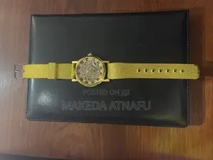 Photo - Gold-tone Meykey Skeleton Watch With A Mesh Strap