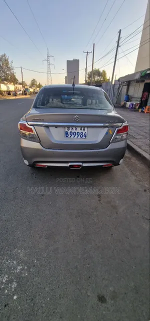 Photo - Suzuki Dzire 2021 Silver