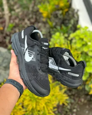 Photo - Nike Shield Running Shoes