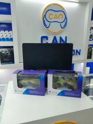 Photo - Playstation 4 Slim (ነፃ Delivery