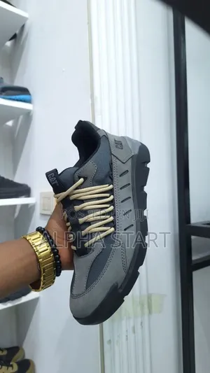  Caterpillar Sneakers 
 Made in Vietnam