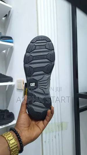  Caterpillar Sneakers 
 Made in Vietnam