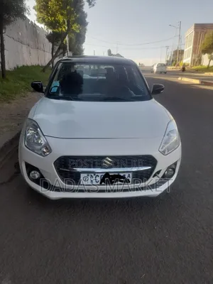 Photo - Suzuki Swift 2022 White