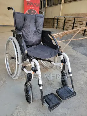 Wheelchair罌昍wheelchair Features a Durable Strong Folding Steel Frame