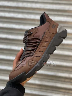 Photo - Brown Cat Rugged Sneakers