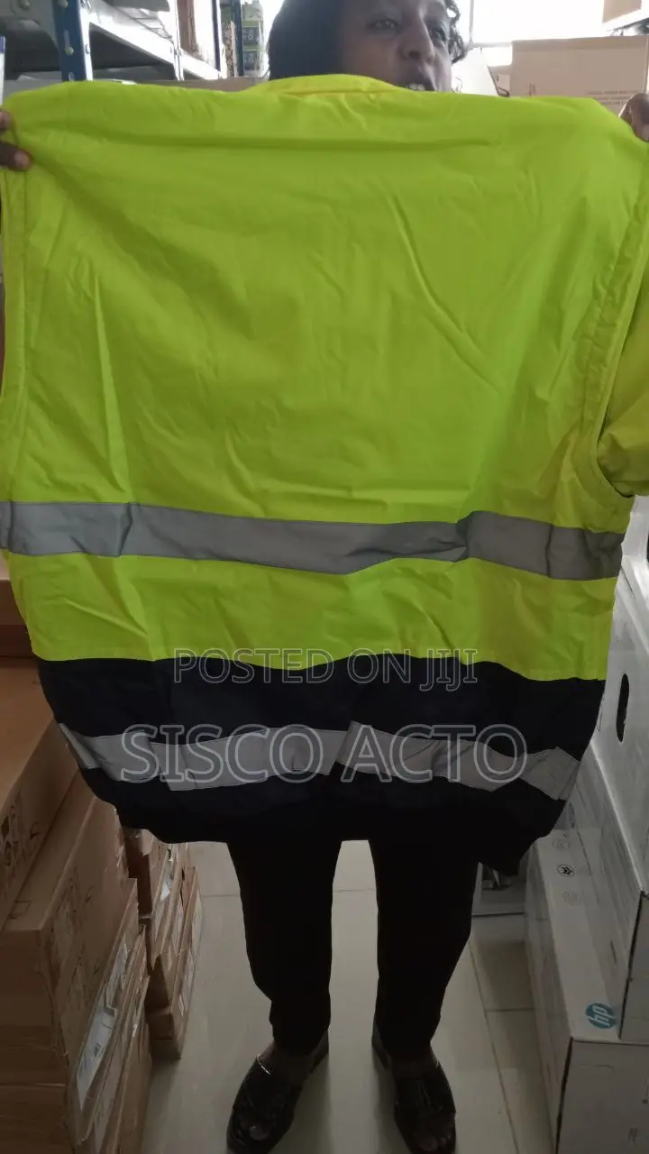 Safety Jacket With Brand Name "Junior" Brand Safety Work Wear.