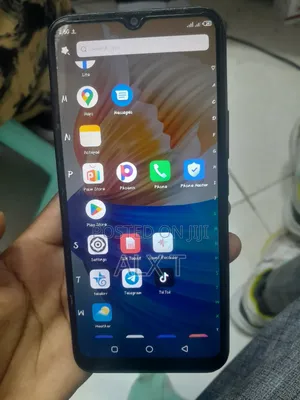 Photo - Infinix Smart 6 32 GB