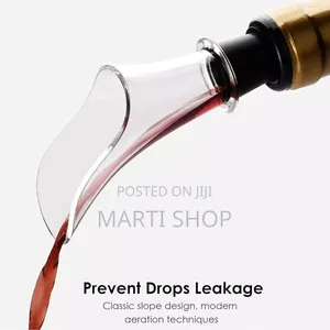 Photo - Wine Pourer And Cork Stoppers