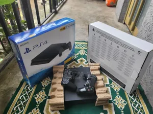 Photo - Playstation 4 Slim አድስ የታሸገ