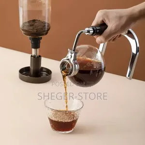 Siphon Coffee Maker
( መብራት ሳይፈልግ በአልኮል ብቻ በፍጥነት ቡና የሚያፈሉበት )