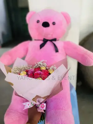 Toy With Bouquet and Chocolate