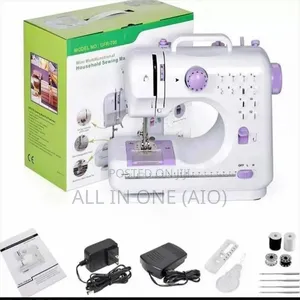 Photo - Mini Portable Home Sewing Machine With Foot Pedal