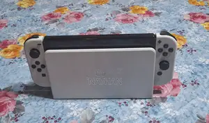 Used Nintendo Switch 1 With 4 Extra Games