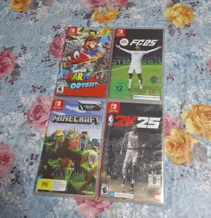 Used Nintendo Switch 1 With 4 Extra Games