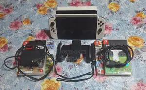 Used Nintendo Switch 1 With 4 Extra Games