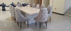 Photo - የገበታ ጠረጴዛ ከ አስር ወንበር ጋር