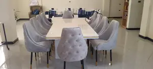 የገበታ ጠረጴዛ ከ አስር ወንበር ጋር