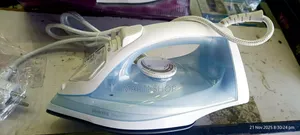 ፊሊፕስ ካውያ (Philips Electric Iron)