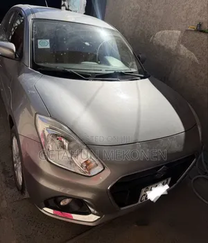 Photo - Suzuki Dzire 2023 Silver