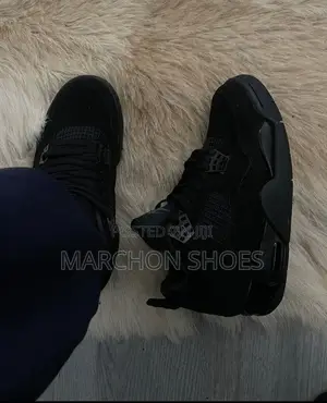 “Black Cat” Nike Air Jordan 4 Retro — Women