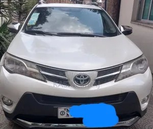 Photo - Toyota RAV4 LE 4dr SUV AWD (2.5L 4cyl 6A) 2015 White