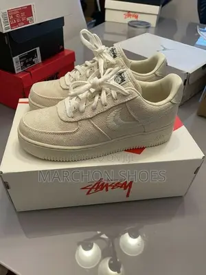 Photo - Nike Air Force 1 Low X Stussy “Fossil”