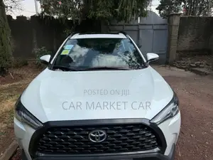 Photo - Toyota Corolla Cross Hybrid 2024 White