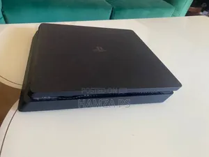 Photo - Playstation 4 Slim በቅናሽ