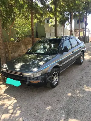 Photo - Toyota Corolla Hatchback 1990 Gray