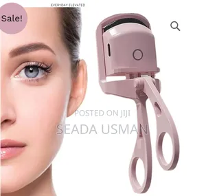 Photo - አውቶማቲክ የሸፋሽፍት ማስተካከያ(Electric Eyelash Curler)