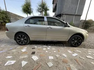 Photo - Toyota Corolla 2003 Gold